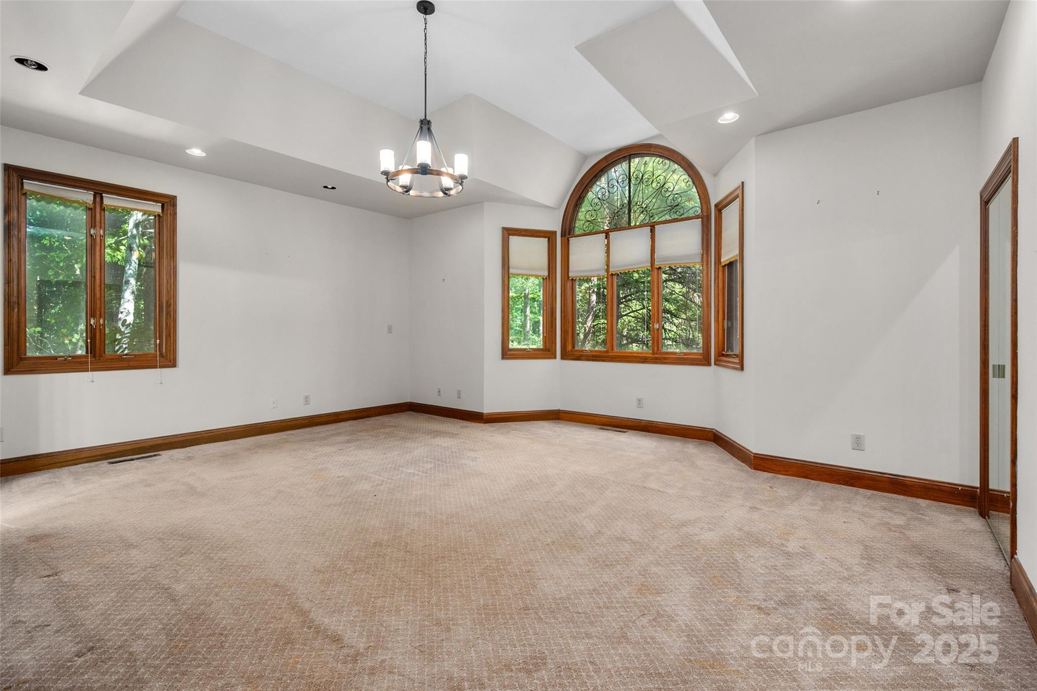 909 Baron Road Waxhaw, NC 28173 - Photo 16 of 46 a view of an empty room with a window