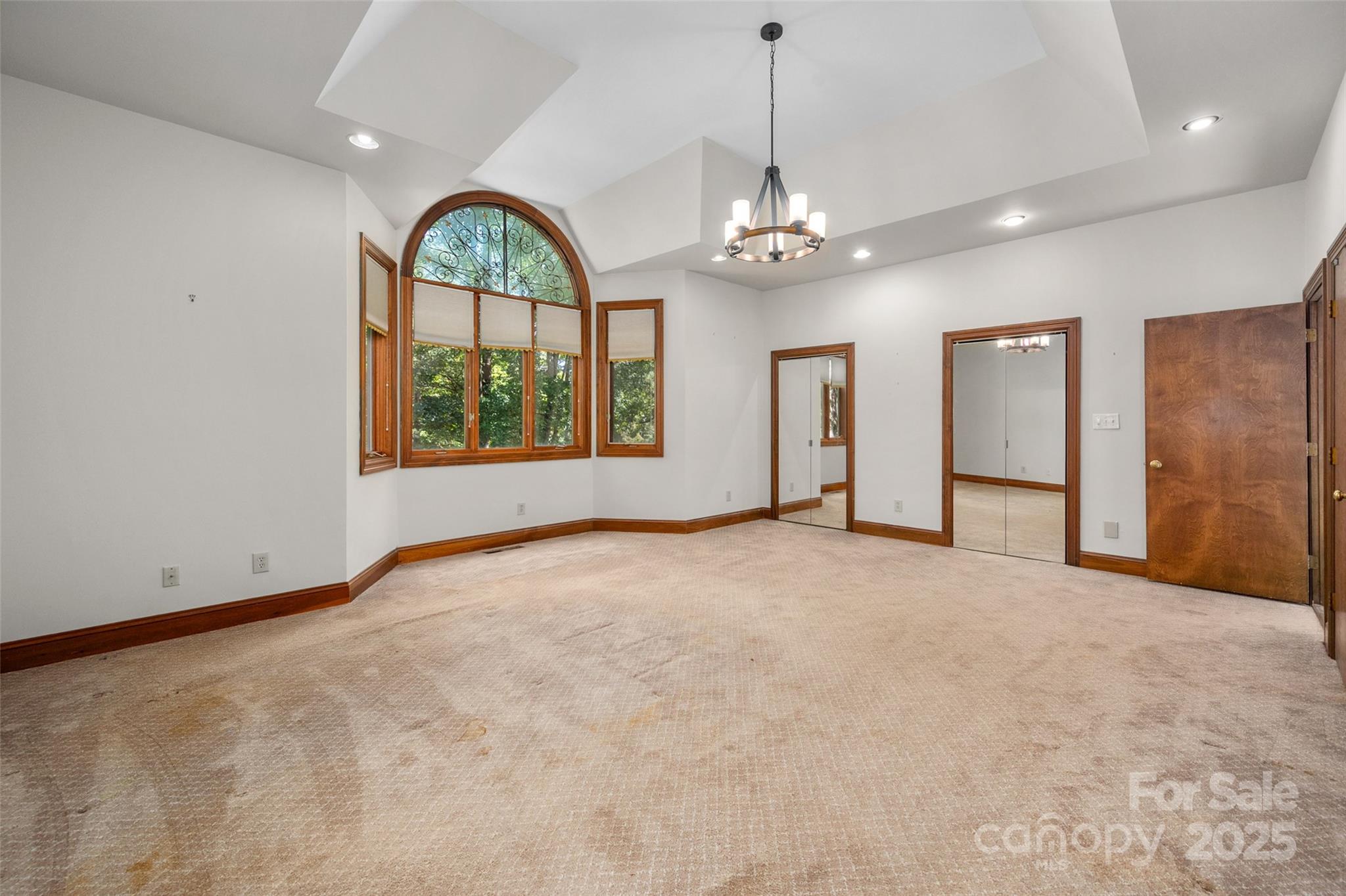 909 Baron Road Waxhaw, NC 28173 - Photo 18 of 46 a view of an empty room with a window