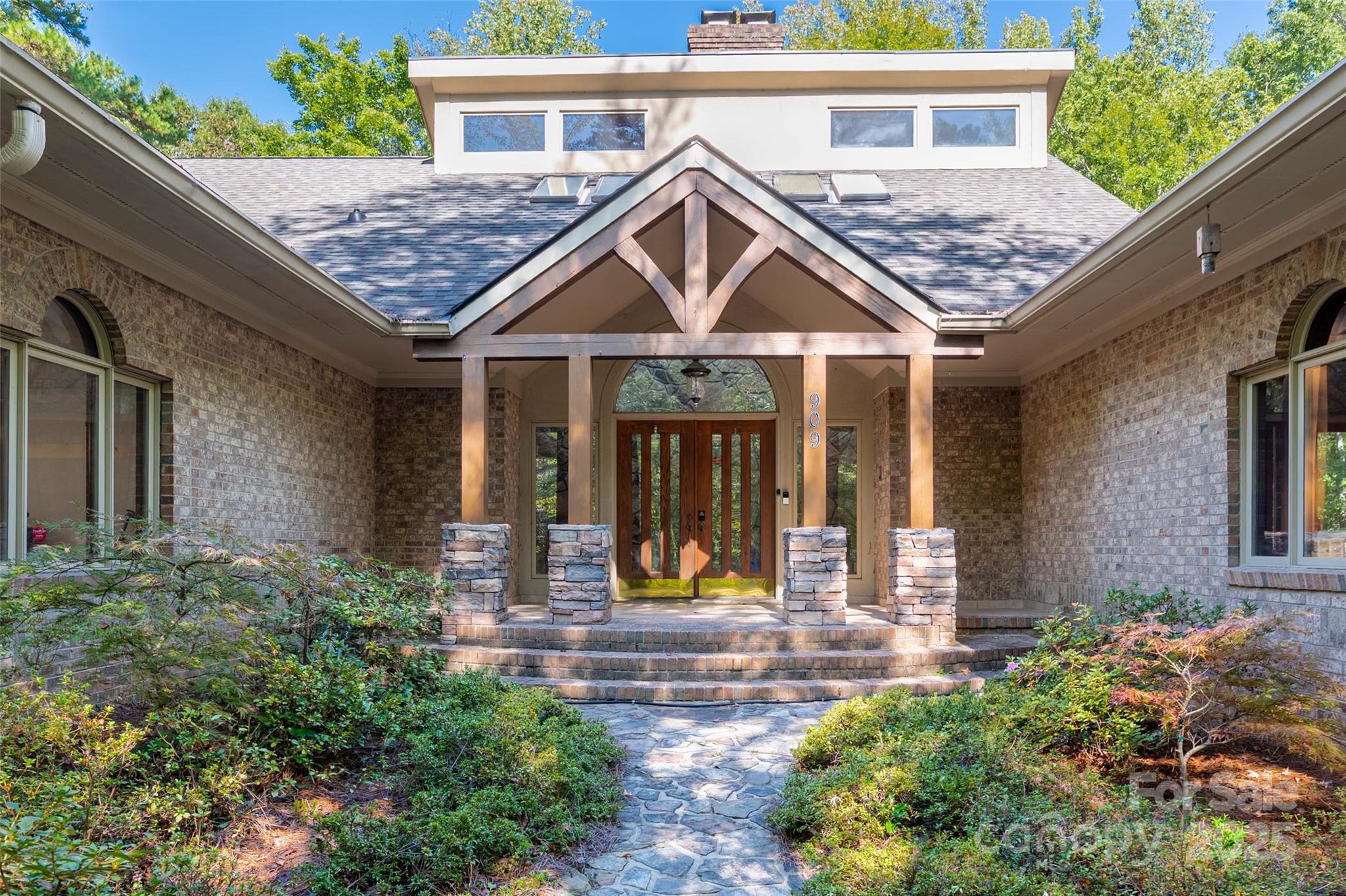 909 Baron Road Waxhaw, NC 28173 - Photo 2 of 46 front view of a house with a yard