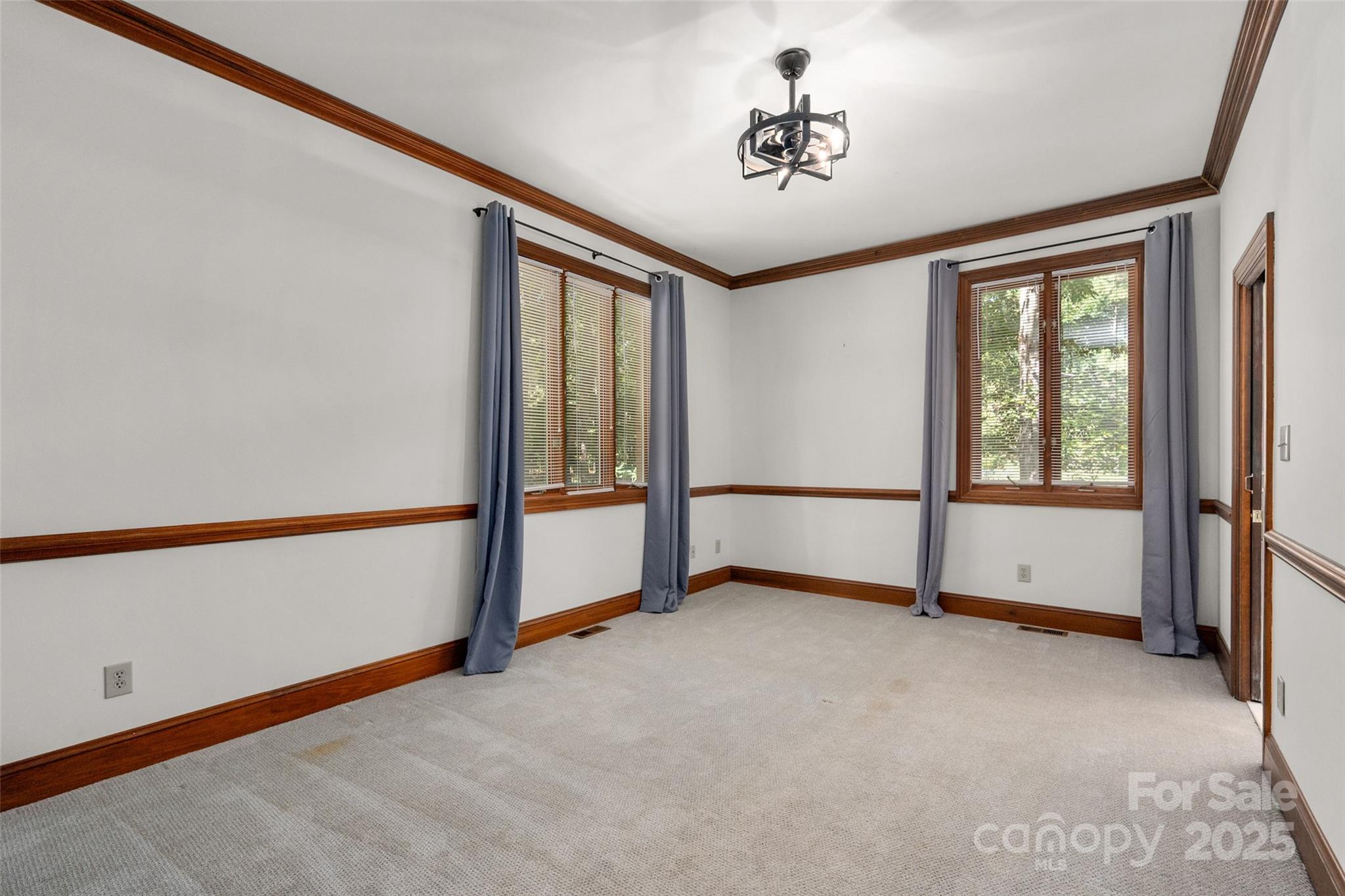 909 Baron Road Waxhaw, NC 28173 - Photo 23 of 46 a view of an empty room with a window