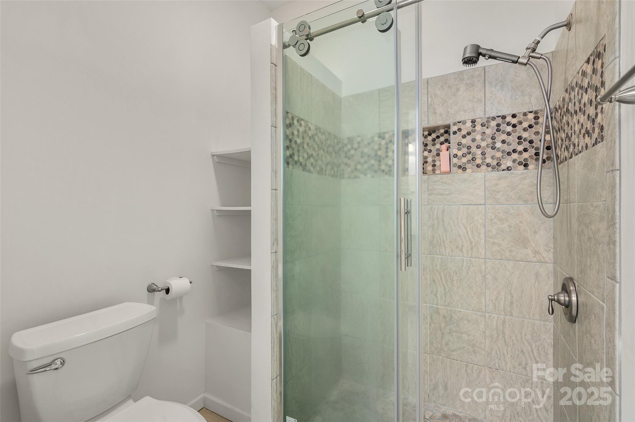 909 Baron Road Waxhaw, NC 28173 - Photo 26 of 46 a bathroom with a shower and toilet