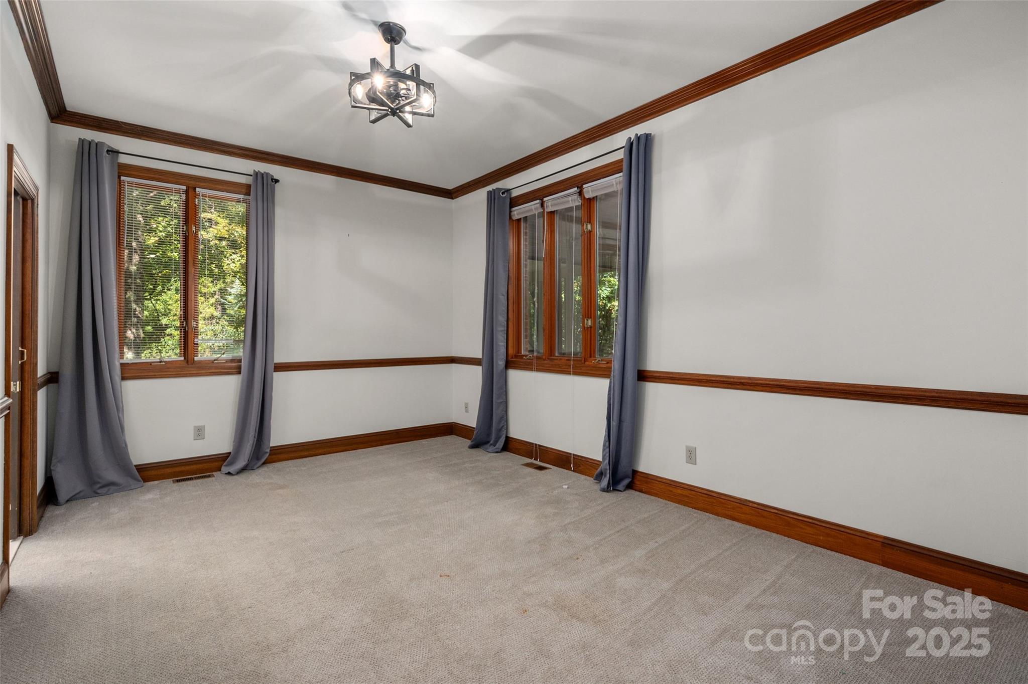 909 Baron Road Waxhaw, NC 28173 - Photo 27 of 46 a view of an empty room with a window