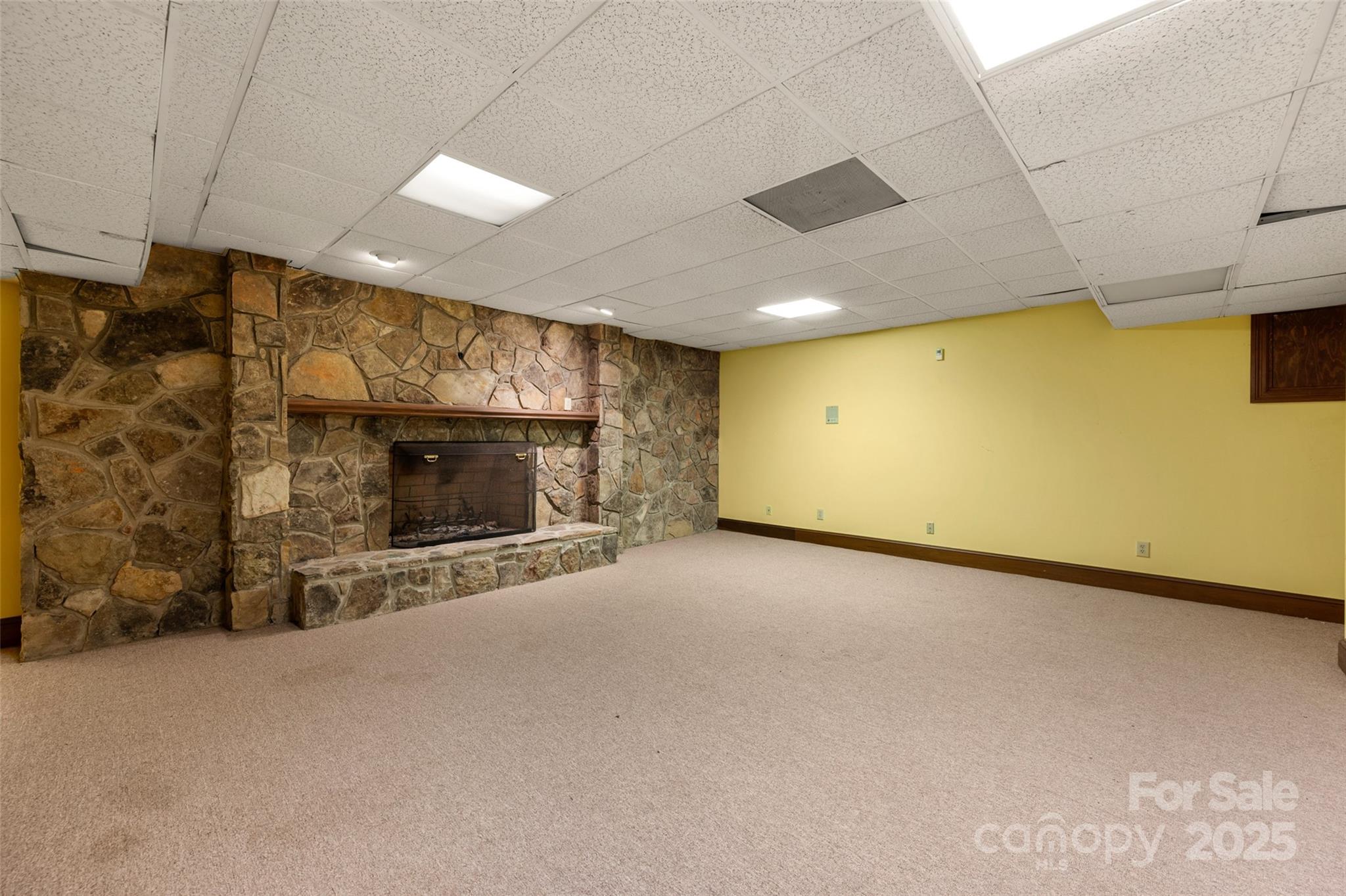 909 Baron Road Waxhaw, NC 28173 - Photo 35 of 46 a view of a empty room with a fireplace