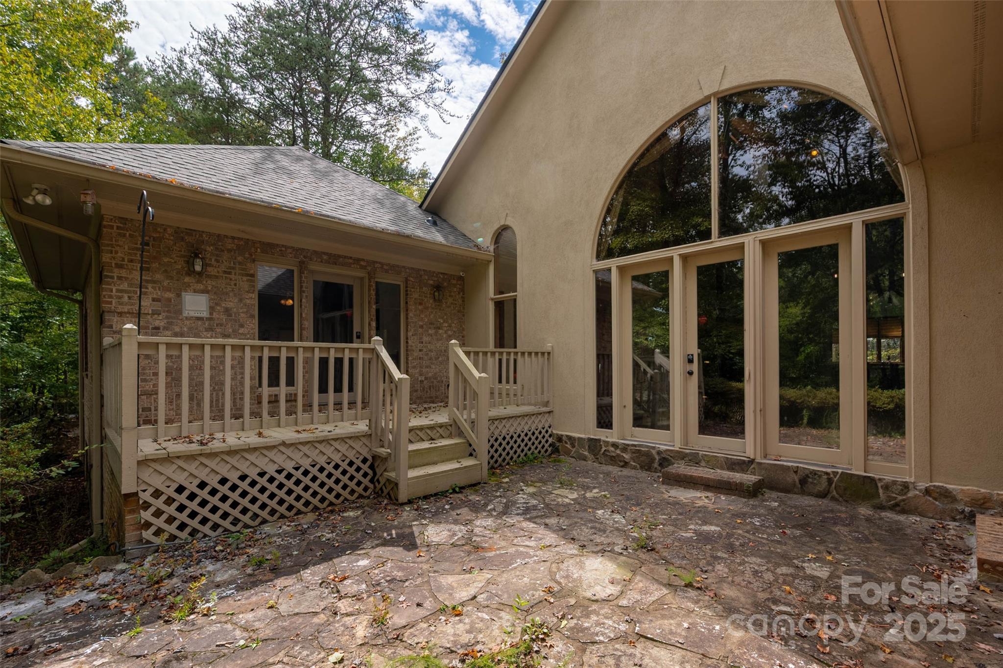 909 Baron Road Waxhaw, NC 28173 - Photo 40 of 46 a view of a house with a window
