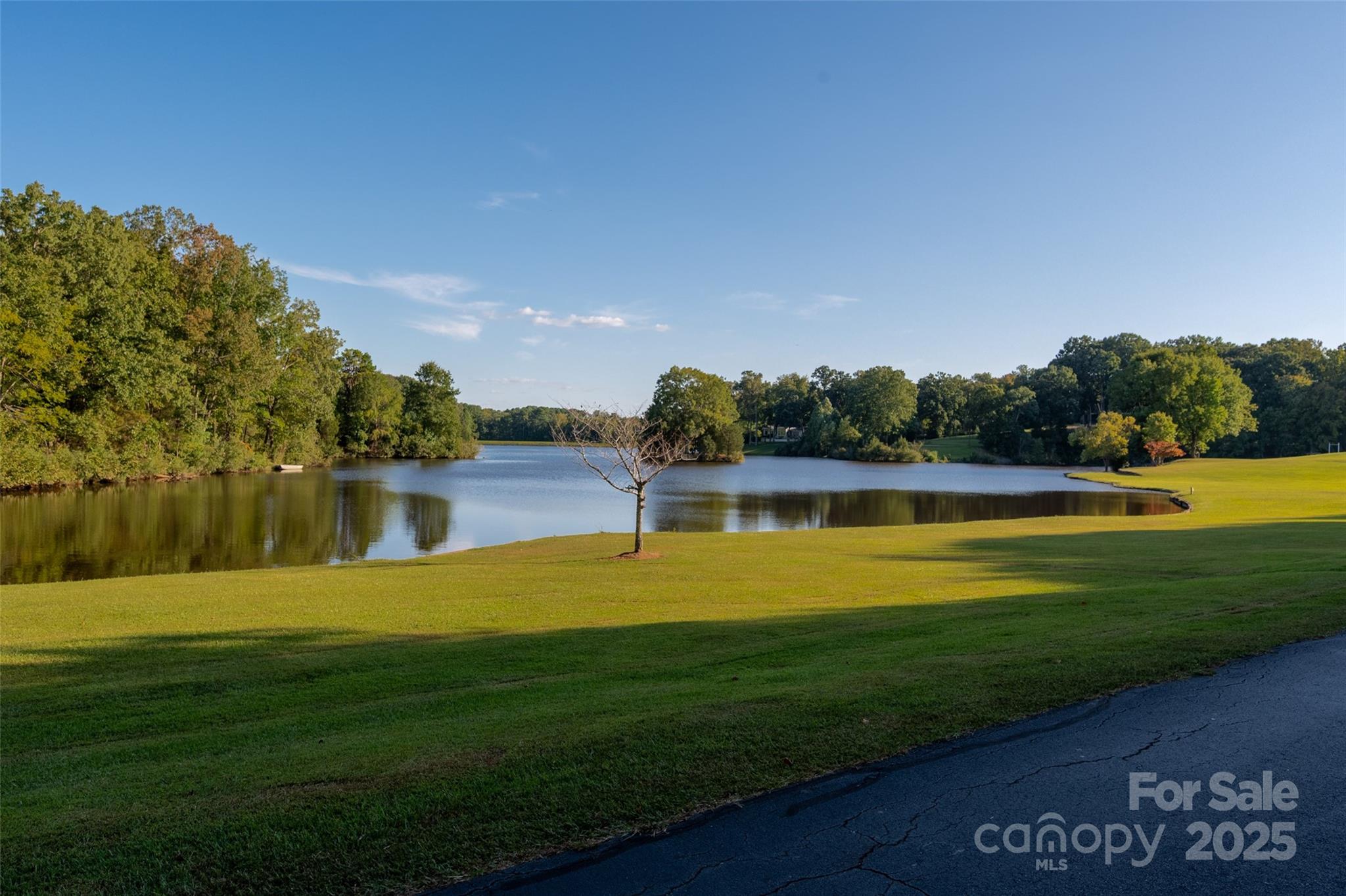 909 Baron Road Waxhaw, NC 28173 - Photo 42 of 46 a view of a swimming pool with an outdoor space and seating area