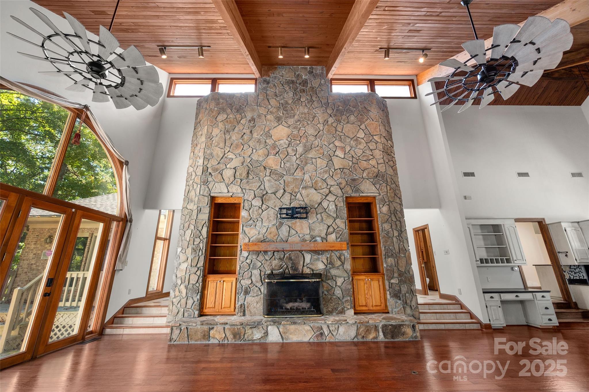 909 Baron Road Waxhaw, NC 28173 - Photo 10 of 46 a living room with furniture and a fireplace