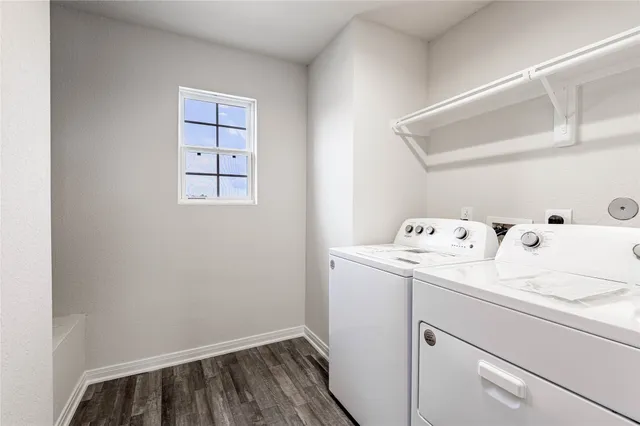 a utility room with dryer and washer