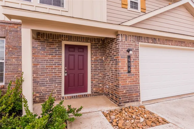 a front view of a building with an outdoor space