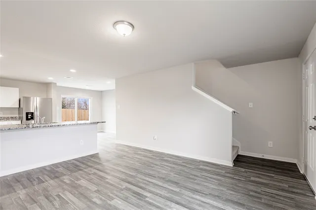 a view of kitchen with wooden floor