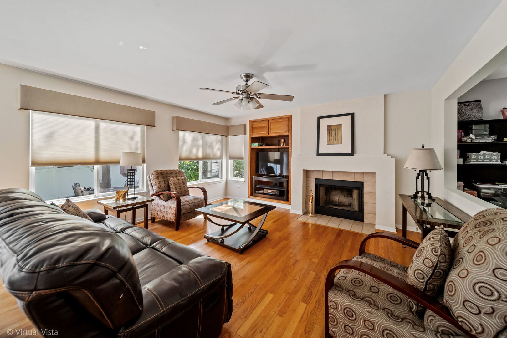 224 Willow Bend Bolingbrook, IL 60490 - Photo 19 of 41 a living room with furniture fireplace and a large window