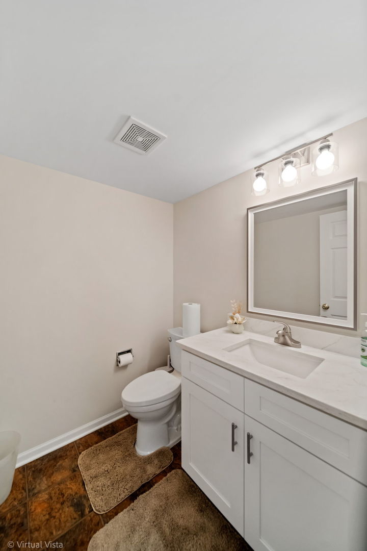 224 Willow Bend Bolingbrook, IL 60490 - Photo 22 of 41 a bathroom with a sink toilet and mirror