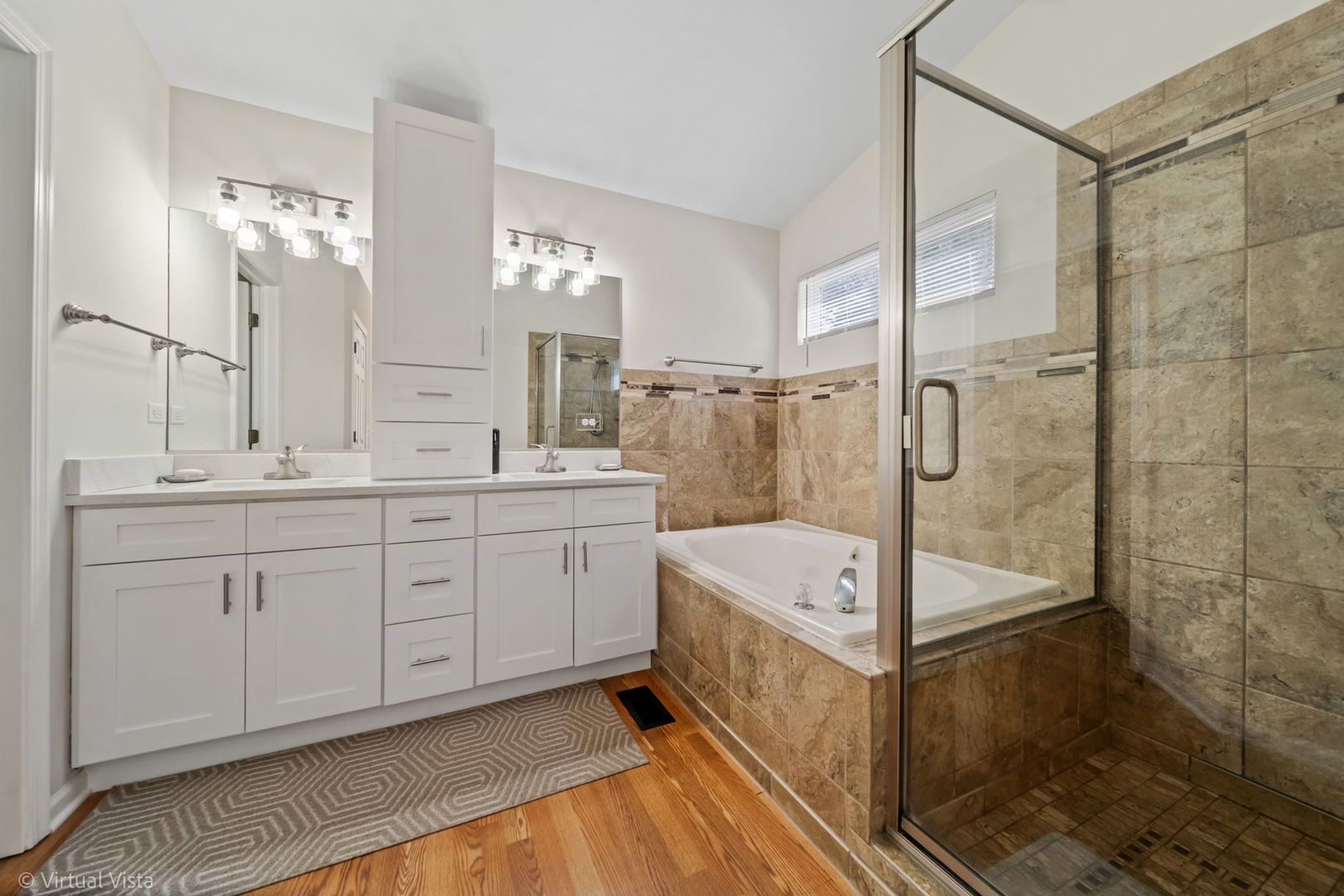 224 Willow Bend Bolingbrook, IL 60490 - Photo 26 of 41 a spacious bathroom with a double vanity sink a mirror and a bathtub