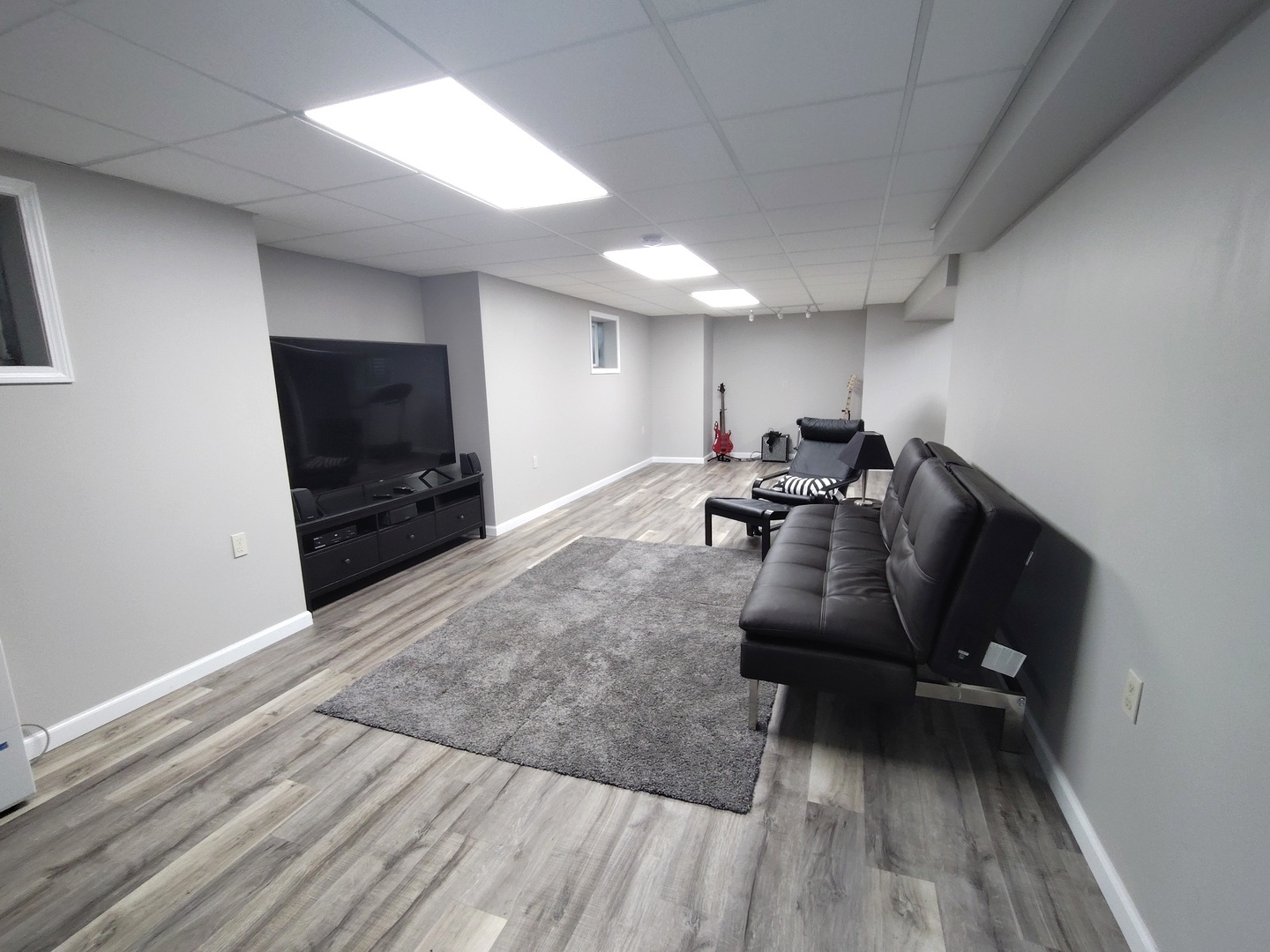 224 Willow Bend Bolingbrook, IL 60490 - Photo 32 of 41 a room with furniture and a flat screen tv
