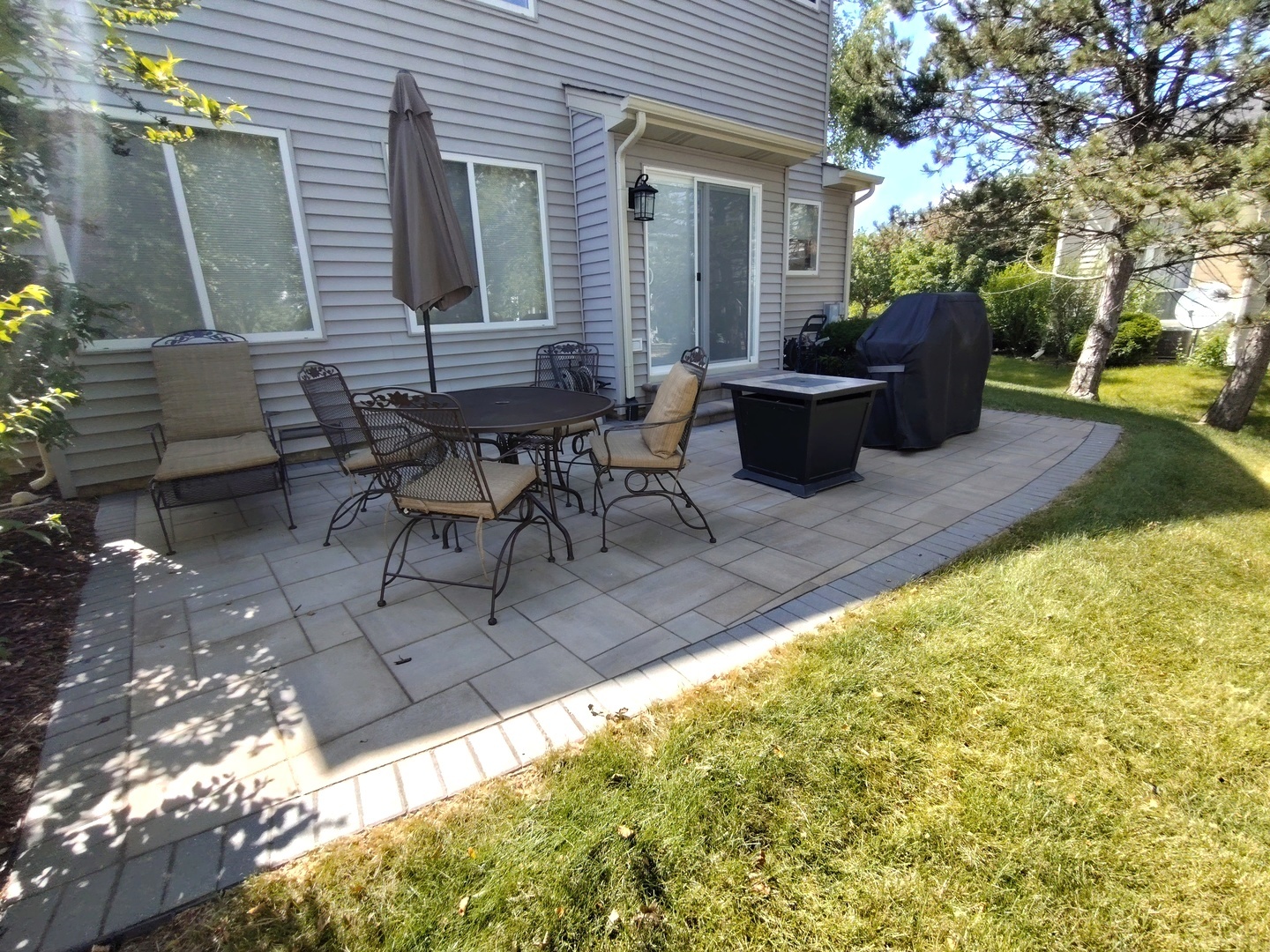 224 Willow Bend Bolingbrook, IL 60490 - Photo 5 of 41 a view of backyard with outdoor seating and plants