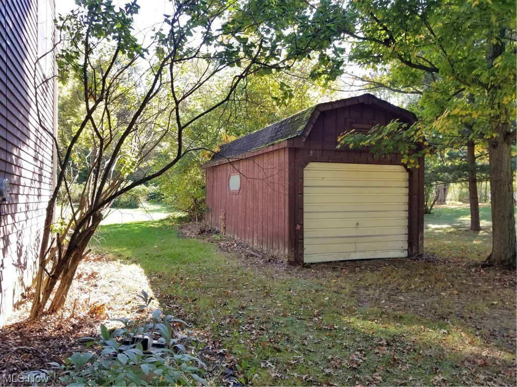 756 Cunningham Road Salem, OH 44460 - Photo 23 of 25 Garage featuring a yard