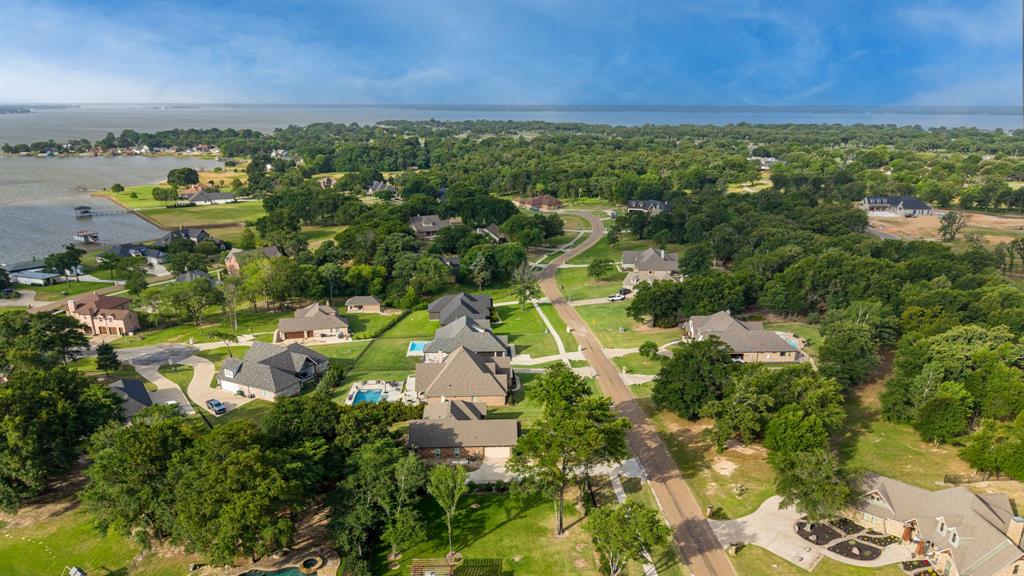 101 Lighthouse Lane Mabank, TX 75143 - Photo 40 of 40 Aerial perspective showcasing a residential community bordered by a substantial body of water