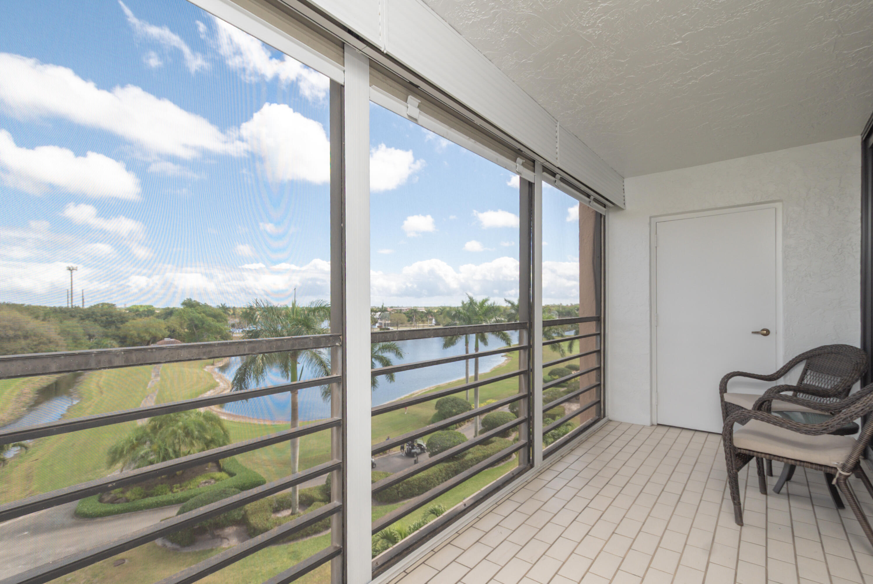 7153 Promenade Drive, Unit 601 Boca Raton, FL 33433 - Photo 9 of 47 Screened top to bottom balcony