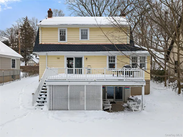 a front view of a house with a patio