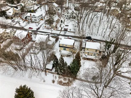 a view of a city with snow