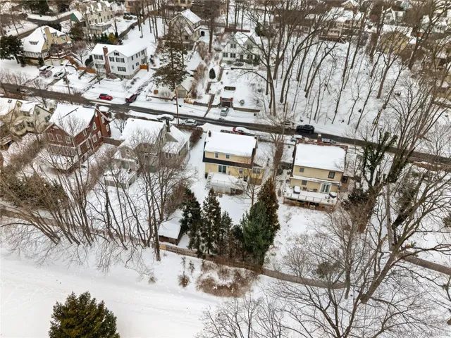 a view of a city with snow