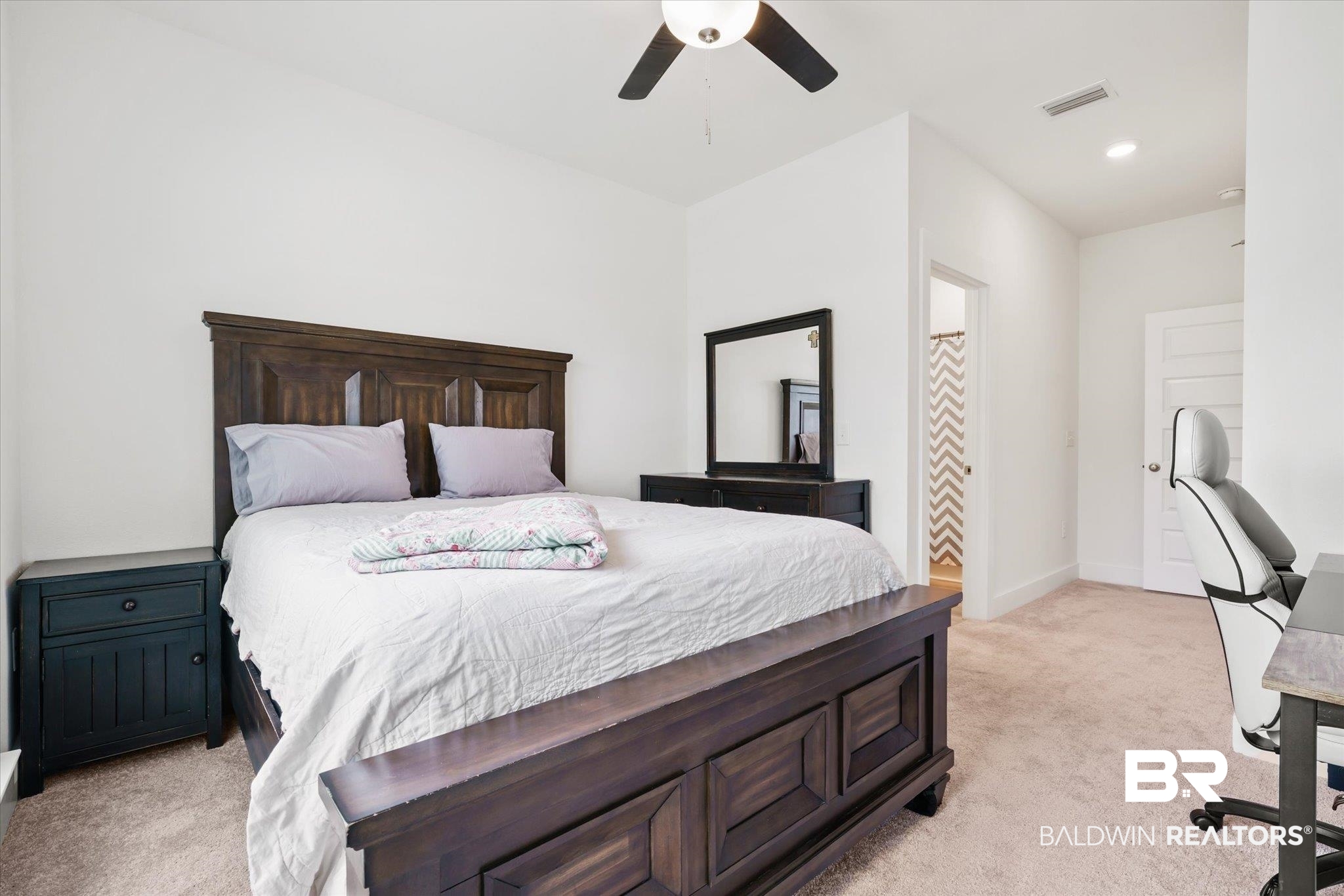 263 Bronze Street Fairhope, AL 36532 - Photo 25 of 47 Bedroom with light colored carpet and ceiling fan