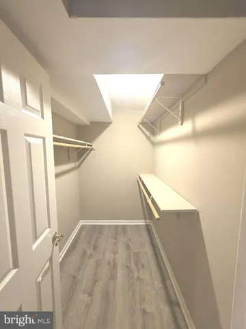 a view of wooden floor in an empty room