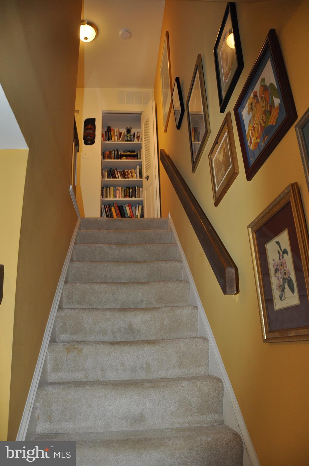 2026 Flowering Tree Terrace Silver Spring, MD 20902 - Photo 7 of 11 WIDE STAIRS TO 2ND FLOOR