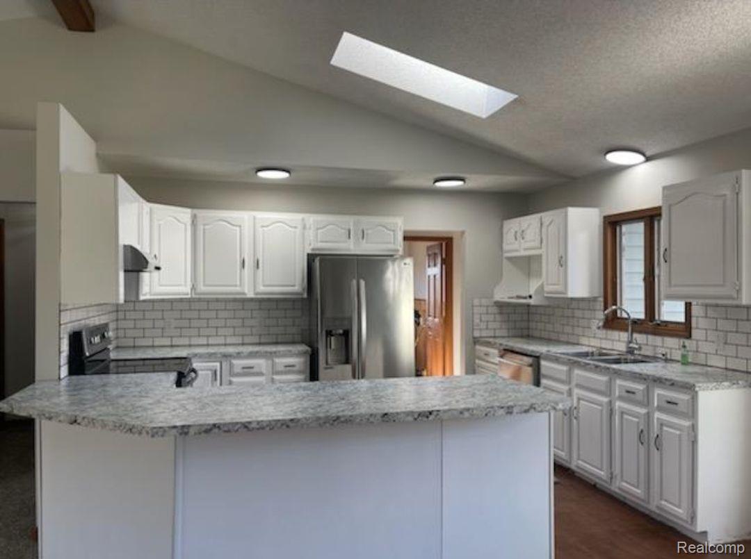 Bright and airy Kitchen with  skylight
