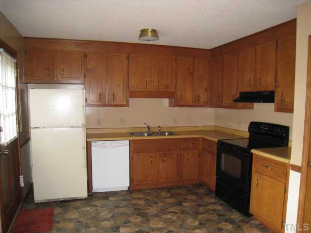 1620 Cane Mill Road Coats, NC 27521 - Photo 8 of 17 Large kitchen with new Maytag smooth top electric range and new Maytag dishwasher.