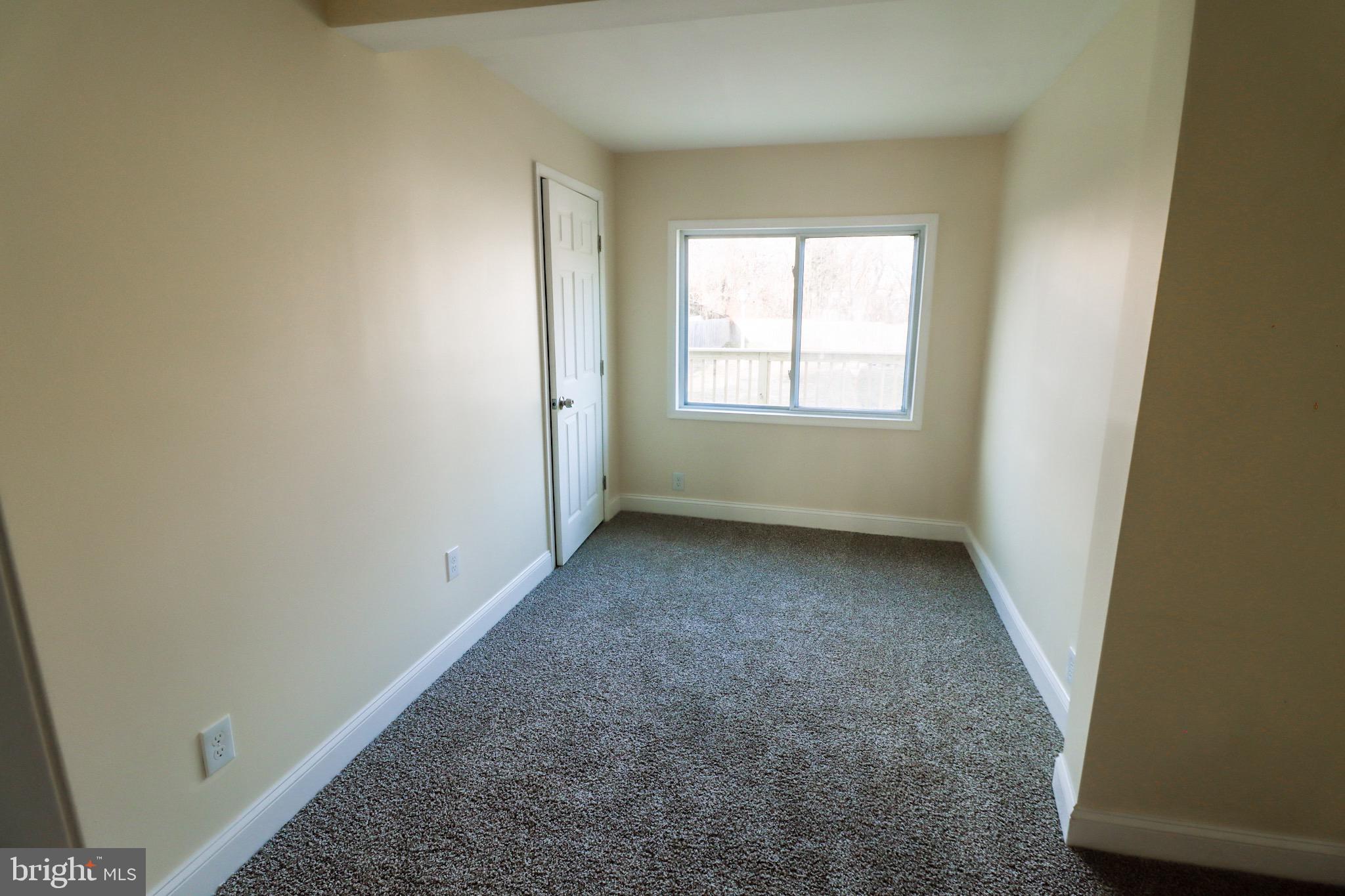 315 Riverside Drive Baltimore, MD 21221 - Photo 14 of 22 an empty room with a window