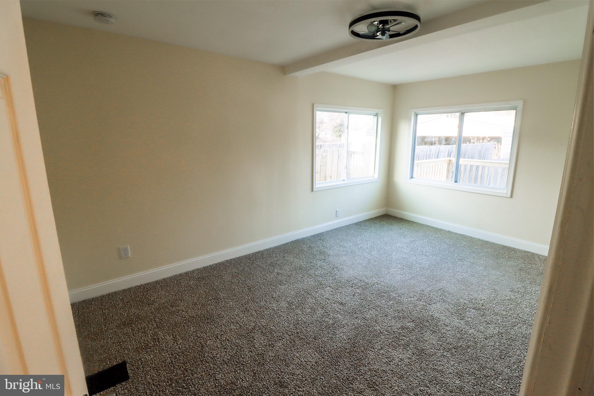 315 Riverside Drive Baltimore, MD 21221 - Photo 18 of 22 an empty room with a empty space and windows