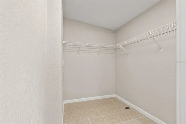 a view of a room with shelf in it