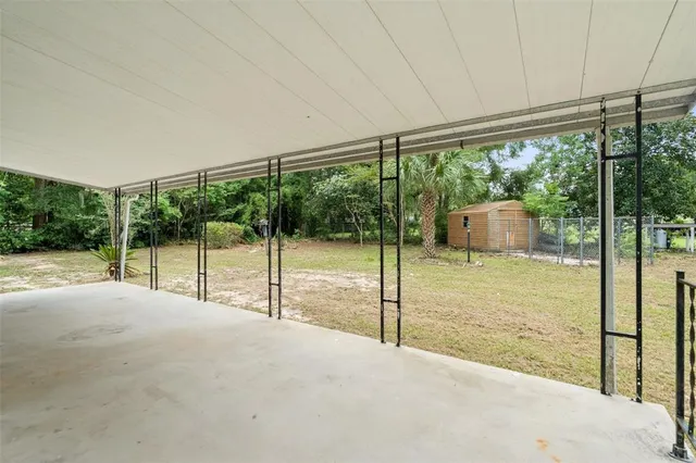 a view of an empty room and window
