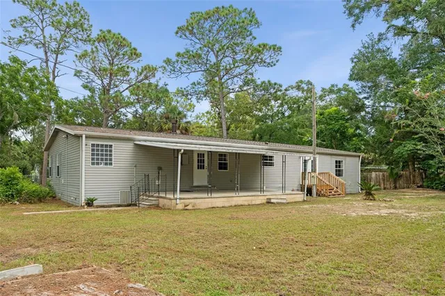 a house view with a outdoor space