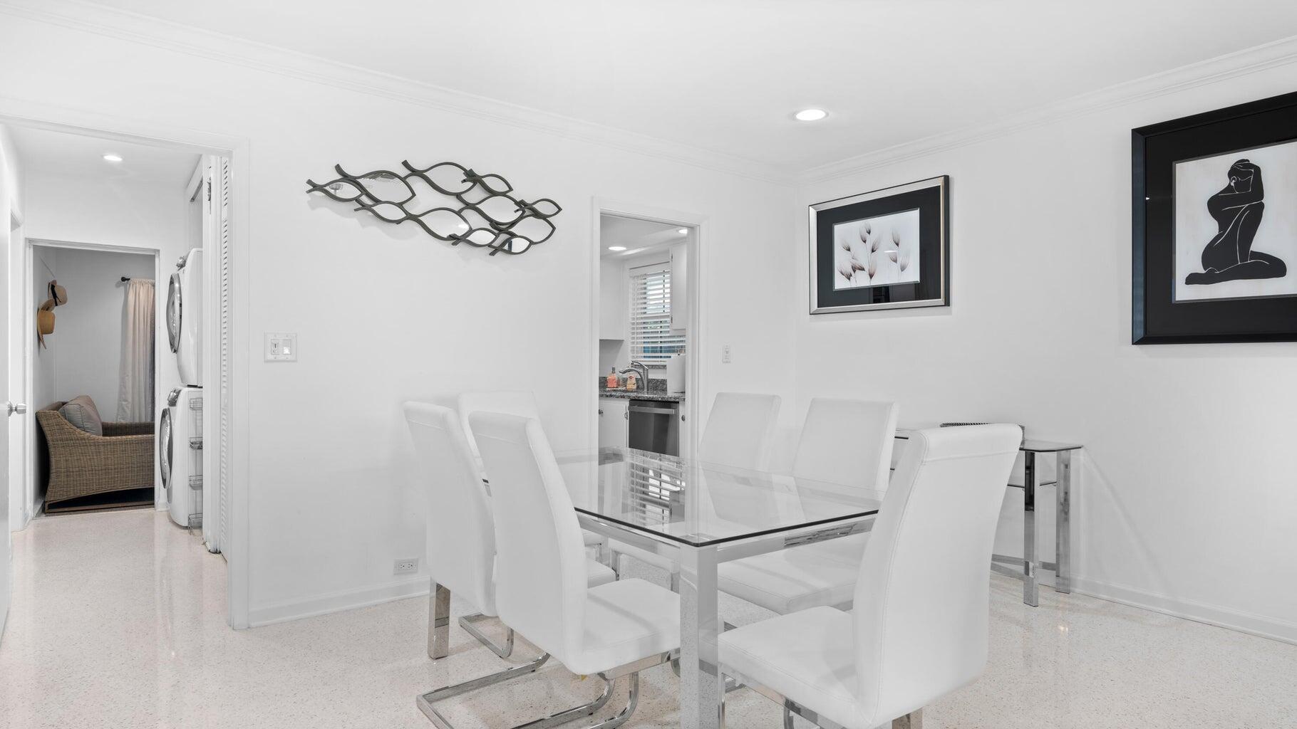 410 Venetian Drive Delray Beach, FL 33483 - Photo 20 of 28 a view of kitchen and living room