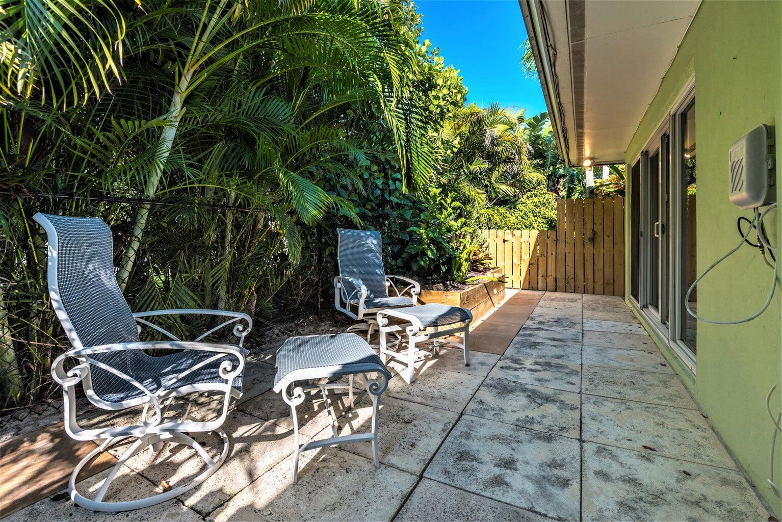 410 Venetian Drive Delray Beach, FL 33483 - Photo 7 of 28 a view of yard with patio
