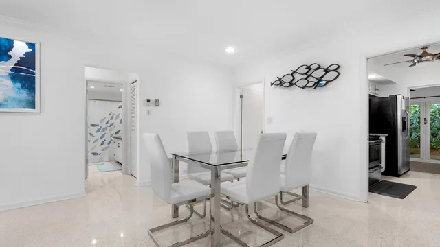 a view of a hallway with seating area