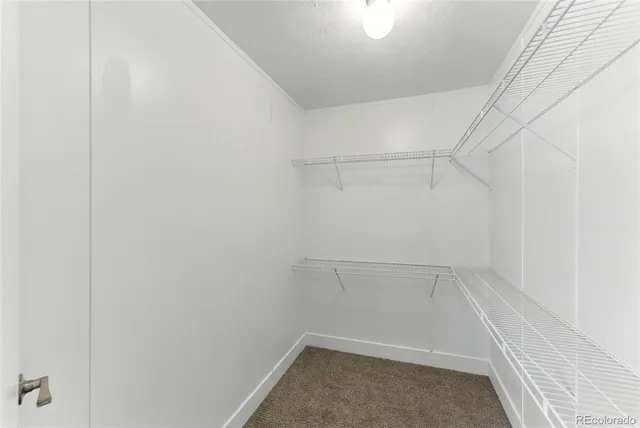 a view of a room with rack on the wall