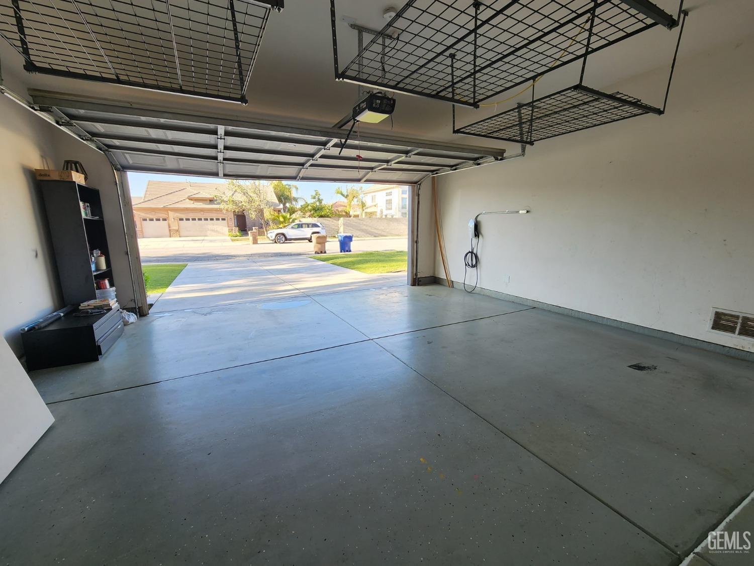 Undisclosed Address Bakersfield, CA 93313 - Photo 16 of 19 a view of empty room with wooden floor