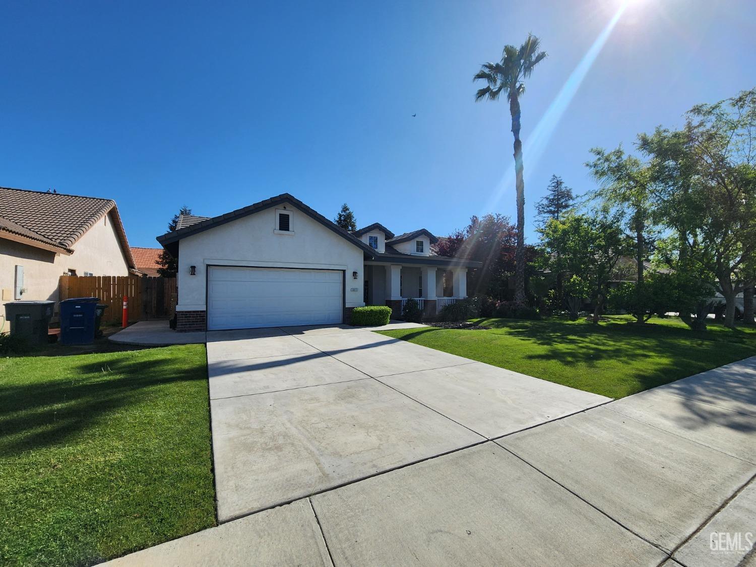 Undisclosed Address Bakersfield, CA 93313 - Photo 2 of 19 a house view with a garden space