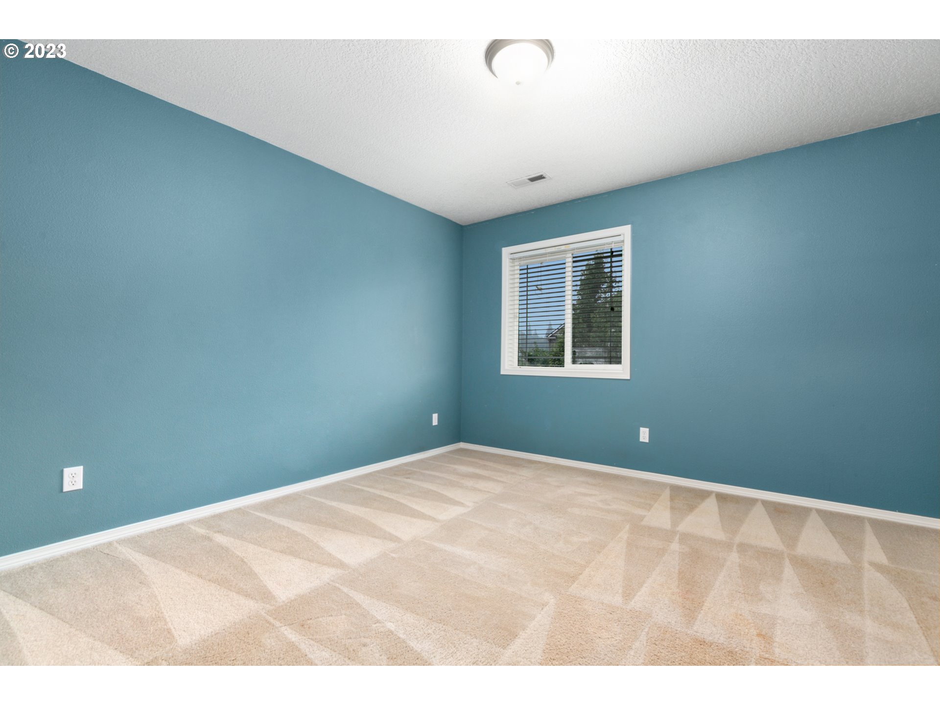 3314 South 2nd Way Ridgefield, WA 98642 - Photo 15 of 27 a view of an empty room with a window