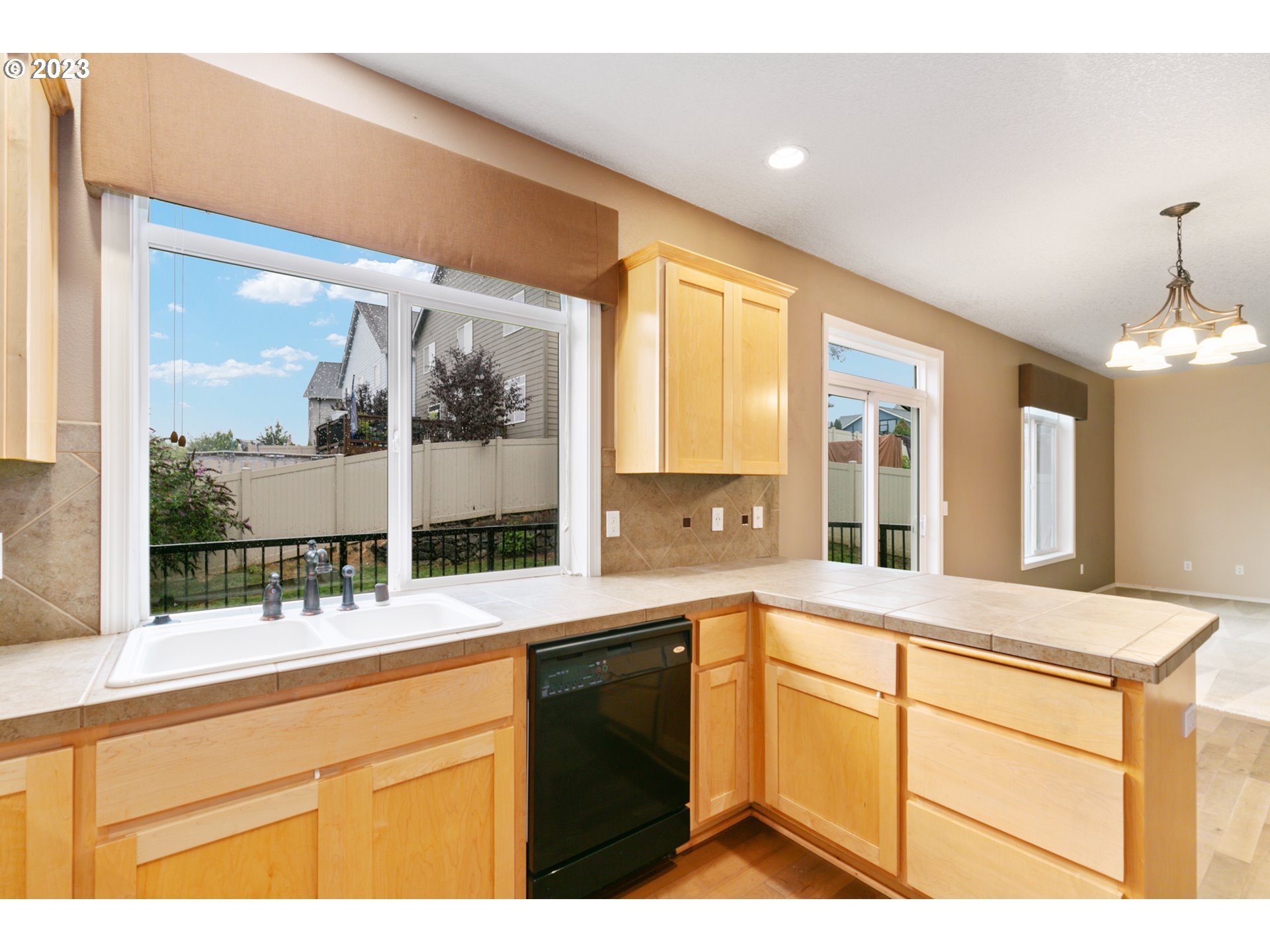 3314 South 2nd Way Ridgefield, WA 98642 - Photo 10 of 27 a kitchen with a sink cabinets and window