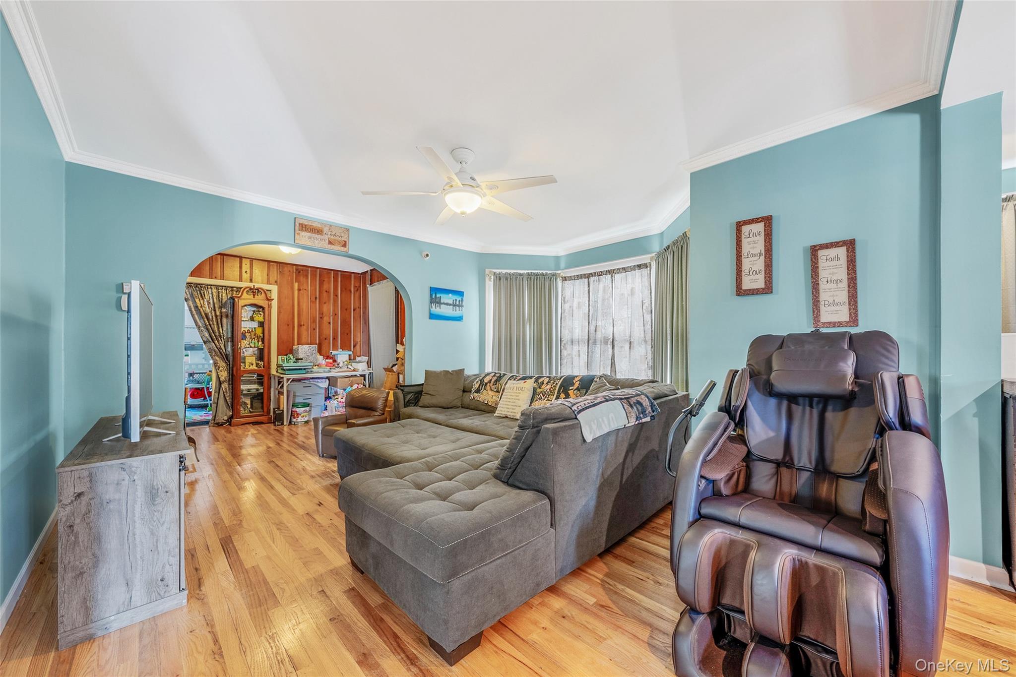80 George Street Babylon, NY 11702 - Photo 20 of 41 a living room with furniture and a large window