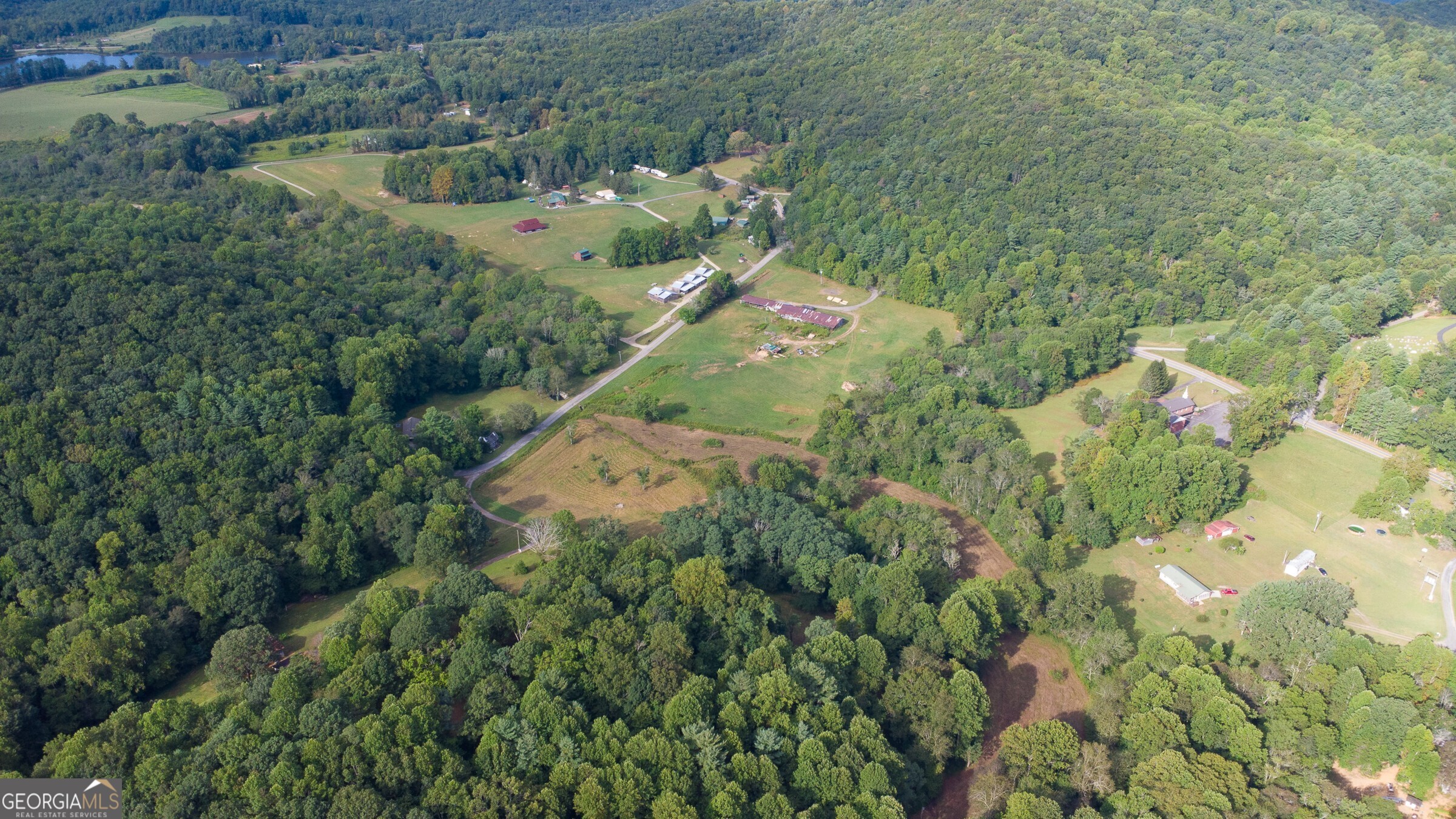 239 Glenn Elliott Road Dahlonega, GA 30533 - Photo 11 of 28 an aerial view of a house with a yard