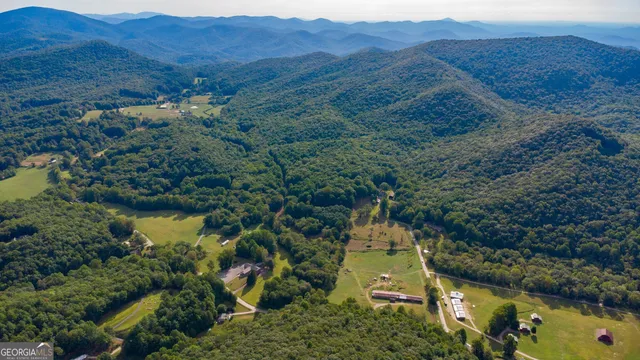 an aerial view of residential house with outdoor space