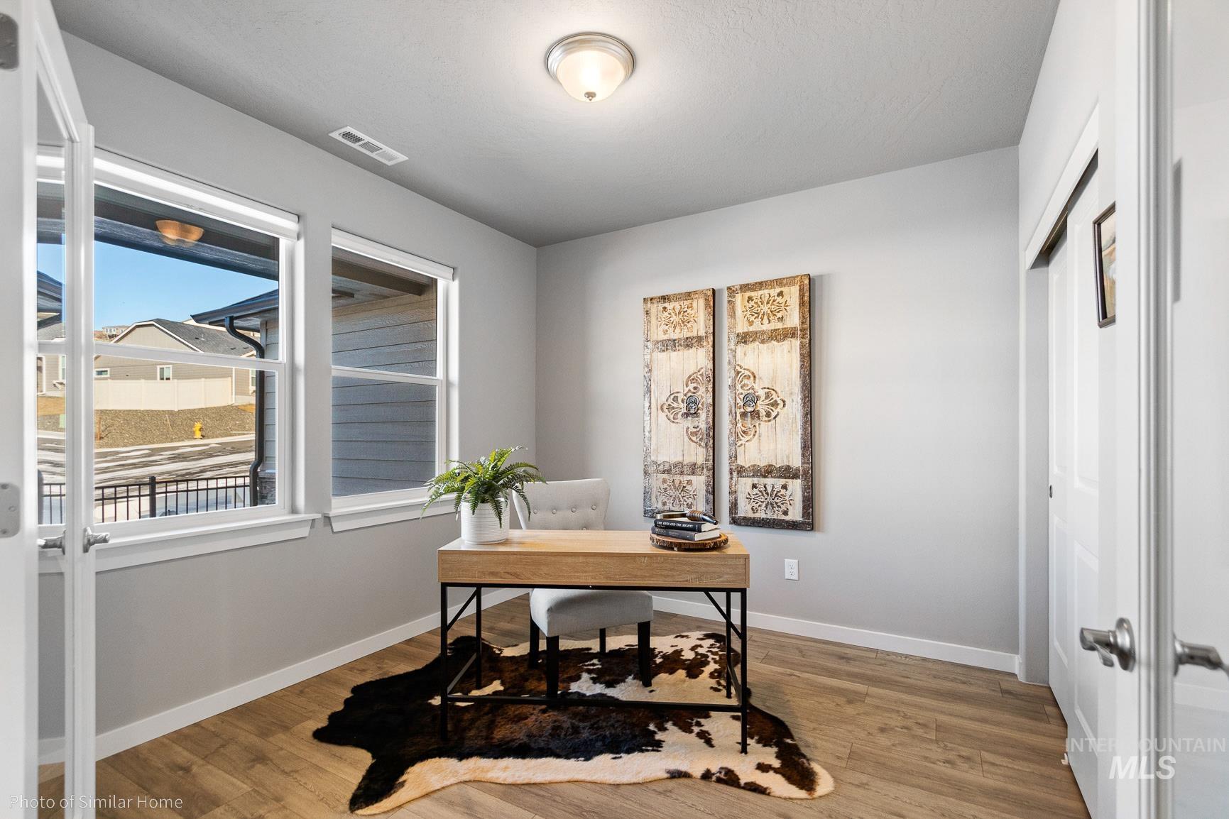 382 West Gleason Court Meridian, ID 83646 - Photo 8 of 21 Home office featuring light wood-type flooring