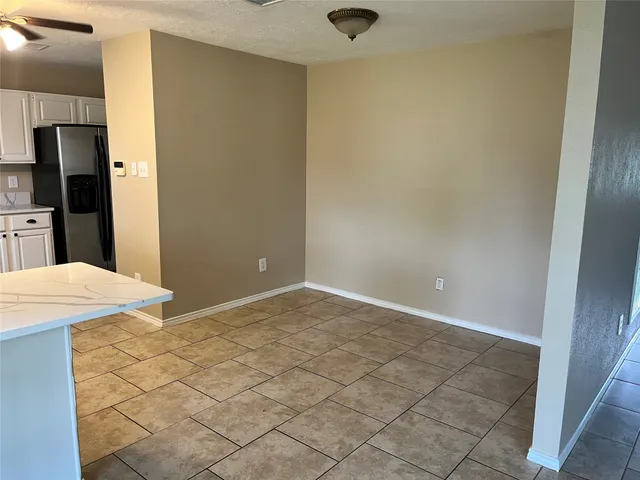 a view of a kitchen with a sink