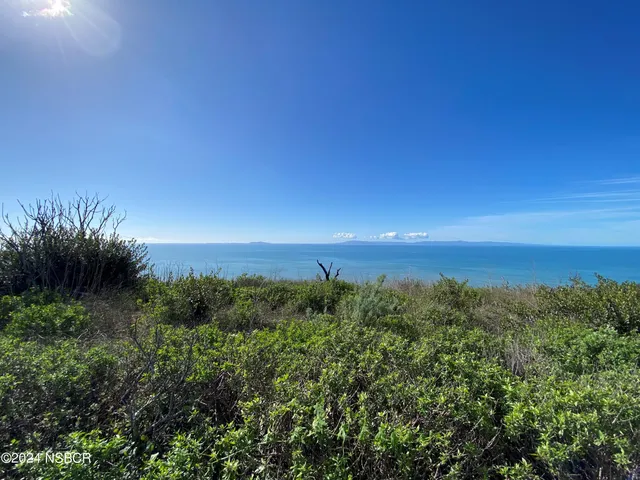 a view of a water heater and a lake view
