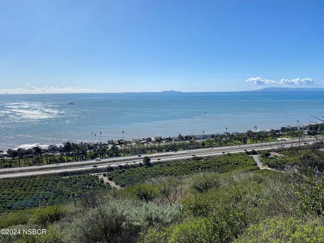 a view of a lake with a mountain