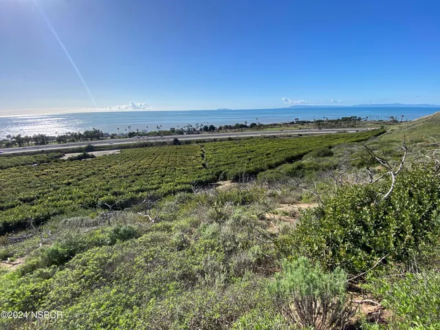a view of a lake with a outdoor space